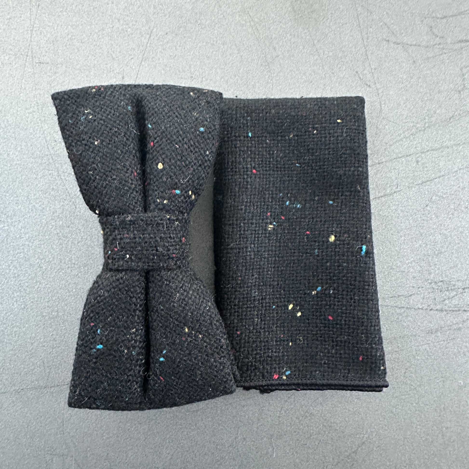 A black bow tie and pocket sqaure for weddings and formal events.