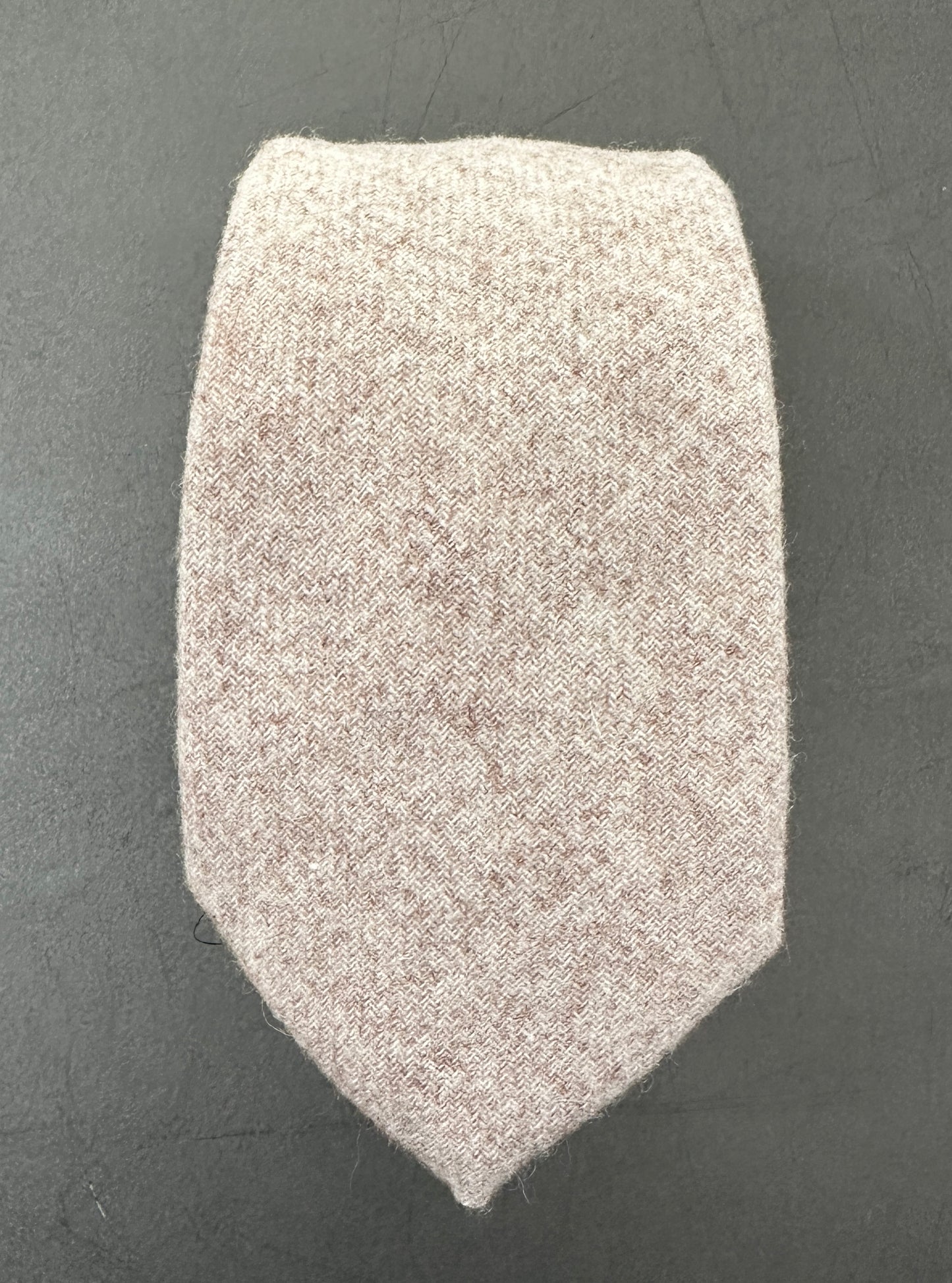 A cream wool tie for weddings and groomsmen.