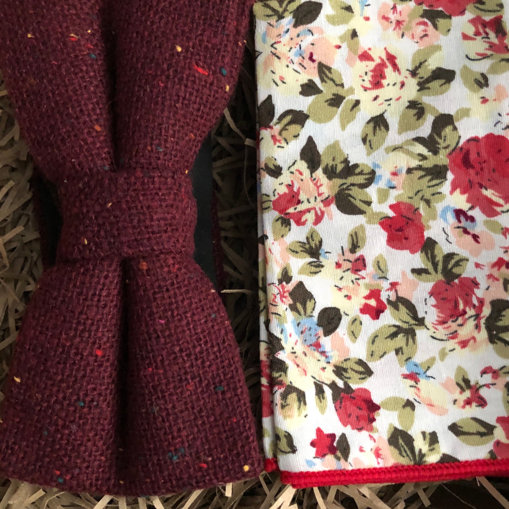 Men's red bow tie and pocket square set. The bow tie is made of high quality flecked wool and the pocket square is in a floral pink rose patter. The set makes a perfect grooms tie, groomsmen gift or men's gift and comes with free gift wrapping. The ties are handmade by Daisy and Oak Studio