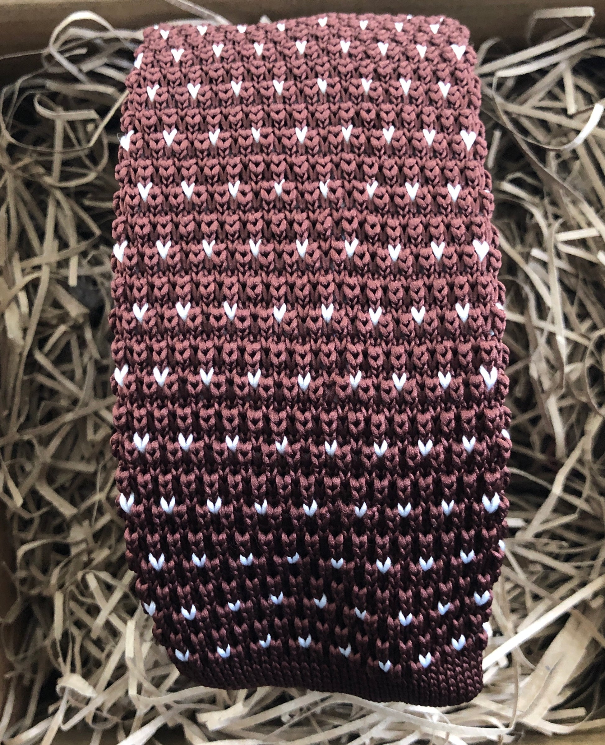 A brown flecked knitted men's tie The tie has a brown background and white flecks. Handmade by Daisy and Oak STudio and comes with free gift wrap and free shipping.