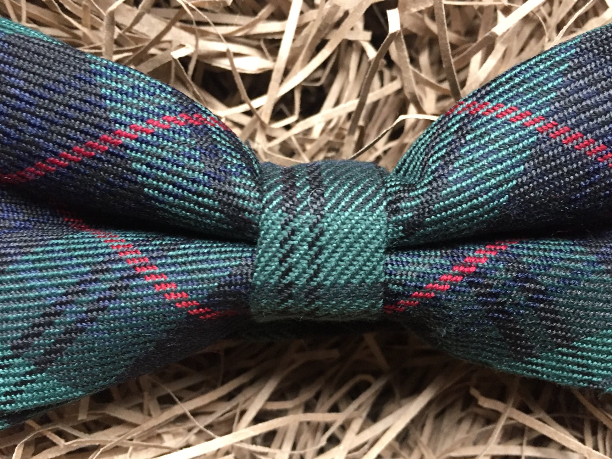 A green wool tartan bow tie which is gift wrapped and perfect as a formal tie, man's gift and is handmade by Daisy and Oak Studio, UK